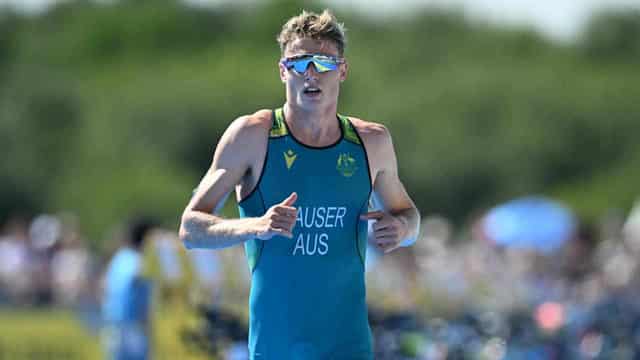 COVID-hit triathlete Hauser qualifies for Olympics