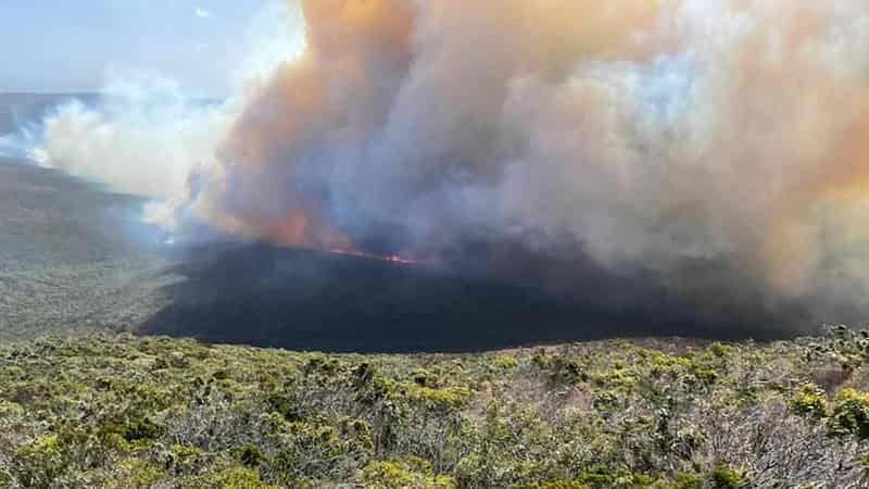 Rain slows fire but risk remains on Bass Strait island