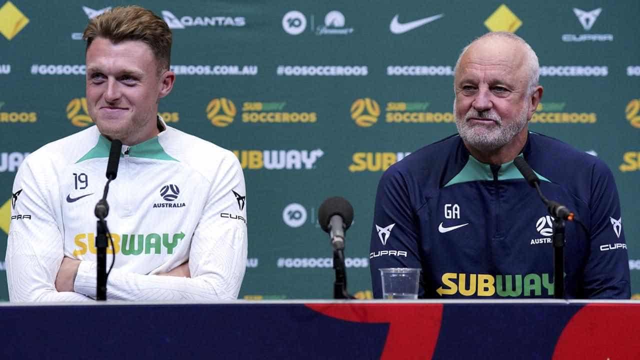 Arnold asks if Albanese has lost his Socceroos' scarf