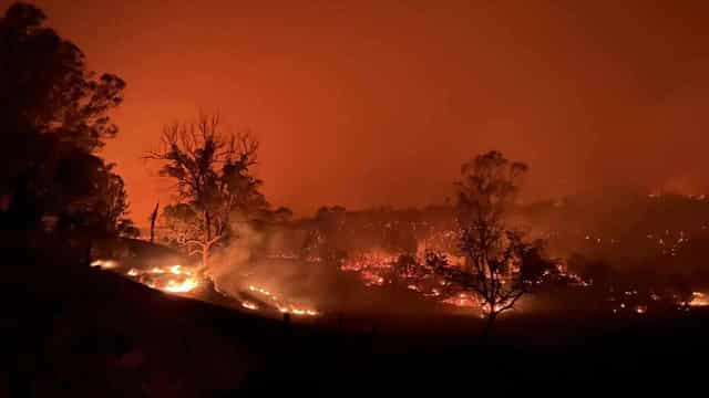 Fire-generated thunderstorm, erratic winds fuels blaze