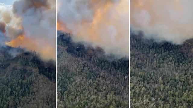 Explosives, homes under threat as fire rages in NSW