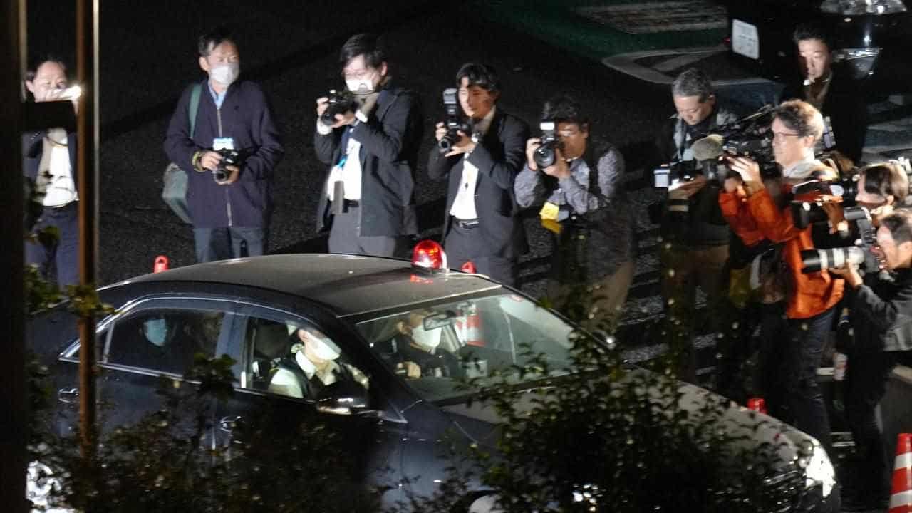 Japan police detain man after post office hostage drama