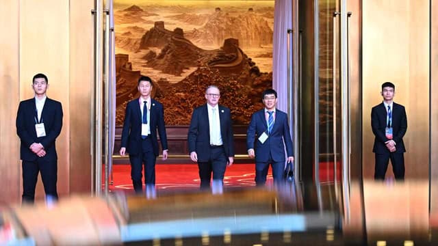 PM tells China 'we value WTO trade rules framework'