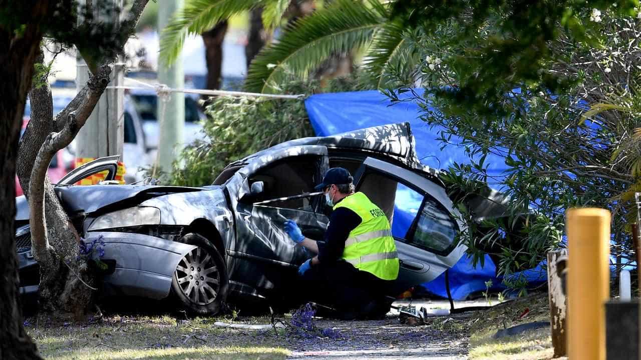 Two boys dead in crash 'carnage' as police hunt driver