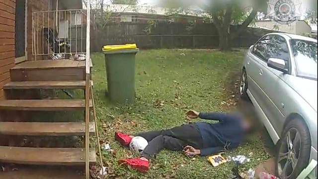 Two charged with attempted murder over tomahawk attack