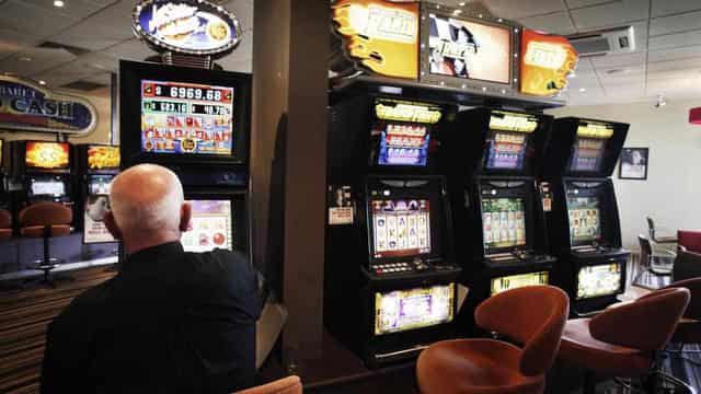 Cashless pokie trial flush with club and pub volunteers