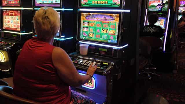 'Massive rort': review under way into pokie club grants