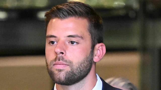 Former premier's cop son found guilty of false evidence