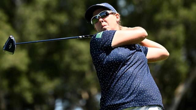 Buhai denies Lee to defend Australian Open crown