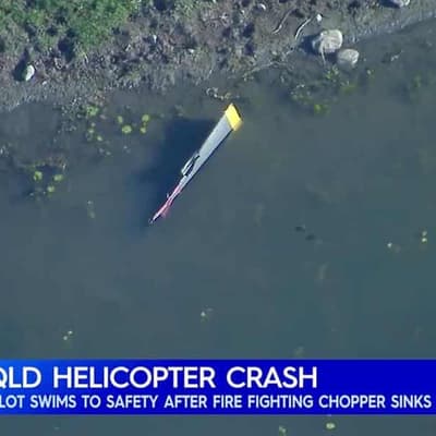 Firefighting pilot escapes as chopper fills with water