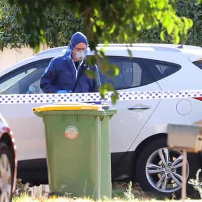 Woman and baby found dead in suburban home