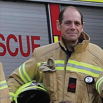 Firefighter killed in burning home identified