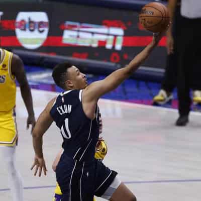 Australia's Dante Exum shoots down LA Lakers in NBA