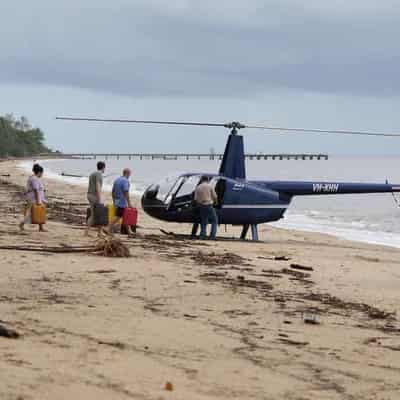 Rescue for stricken town as high cost of cyclone mounts