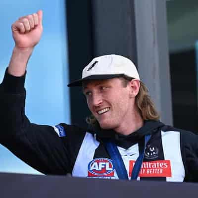 Pies' Murphy to continue AFL career after head knock