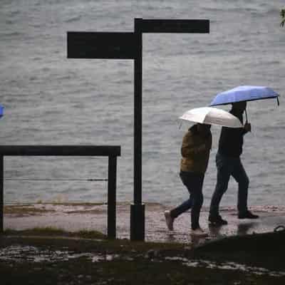 Storms smash Sydney, with flooding rescues under way