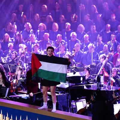 Protesters storm the stage at Carols by Candlelight