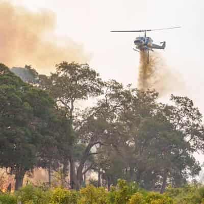 Heatwave continues in WA as firefighters battle on