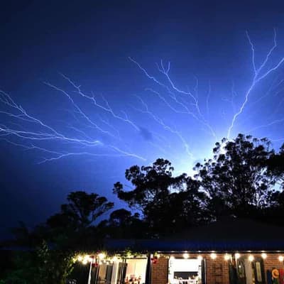 Two dead, four missing as storms lash southeast Qld
