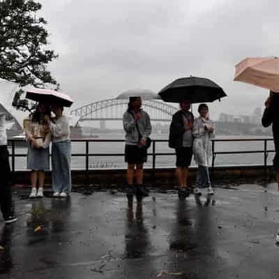 Rainfall records likely as storms batter the east coast