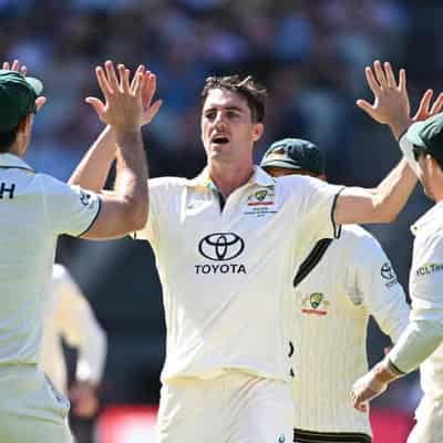 Cummins inspires Australia's MCG wicket frenzy