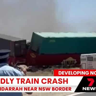 Two dead after train derails in horror truck crash