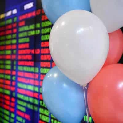 Australian shares start year fraction from record high