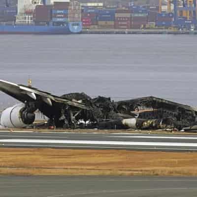 Japan begins twin probes into Tokyo runway collision