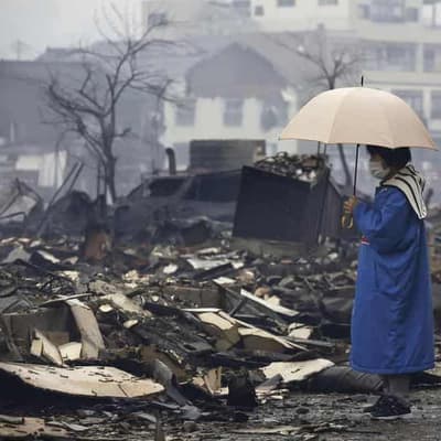 Japan quake rescuers race against time to aid survivors