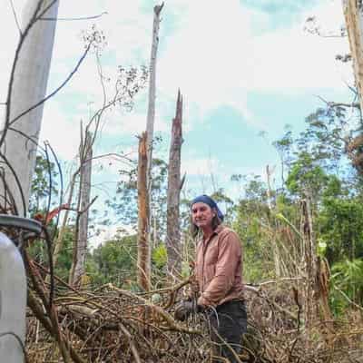 Storm-hit residents clean up as region faces more rain