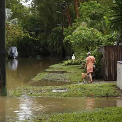 Battling region hit again by heavy rain, cyclone threat