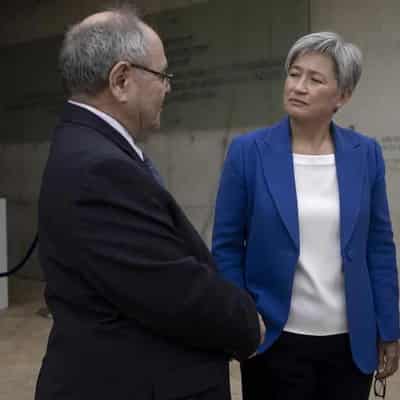 Debate simmers as Wong returns from Middle East mission