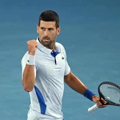 Ruthless Djokovic storms into Open quarter-finals