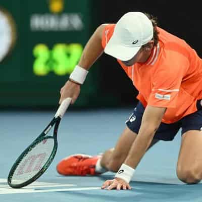 De Minaur out of Open with five-set loss to Rublev