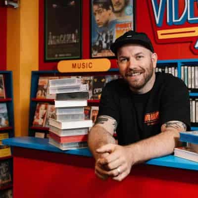 Artist rewinds tape to 1990s with video store replica