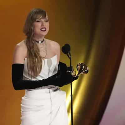 Taylor Swift announces new album while accepting Grammy