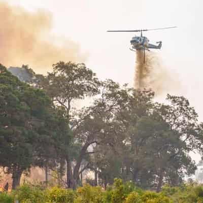 Firefighting water bombers drop sewage water onto homes