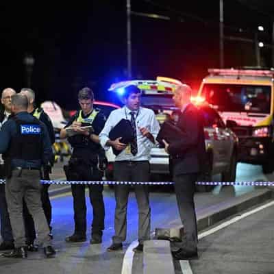 Man shot after confronting police on Melbourne bridge