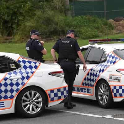 Police officer slashed with knife in Queensland