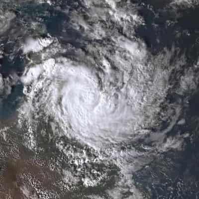 Flood-hit regions brace after cyclone warning issued