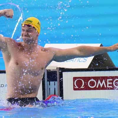 Williamson races to Dolphins' first world swimming gold