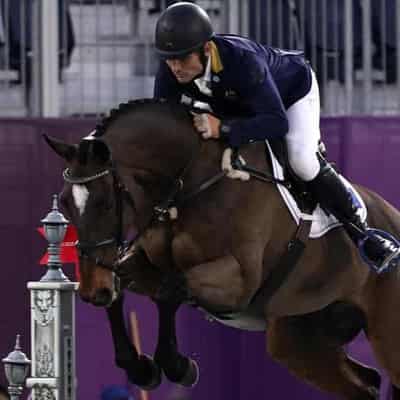 Showjumper Rose apologises, cleared for mankini stunt