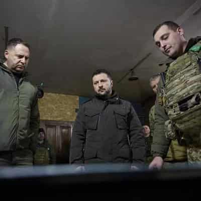 After retreat, Ukraine digs in to repel Russian attacks