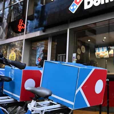 Domino's half-year profit drops 19pct, dividend cut