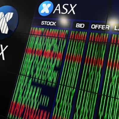 Australian shares hit record high on back of late rally