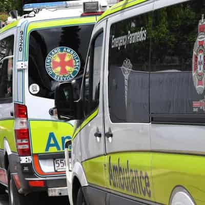 Two people charged after 'disgusting' ambulance attack