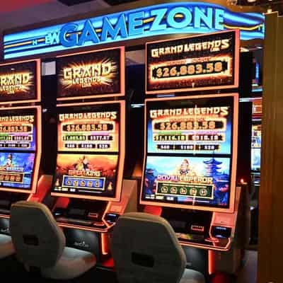 Pokies can't be banned, should be reduced: unions