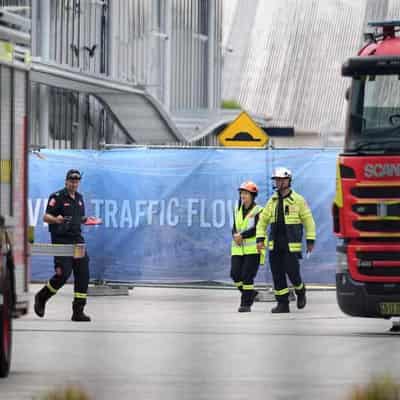 Workers evacuated after sinkhole appears near building