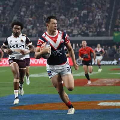 NRL's brutality on show in USA as Roosters stun Broncos