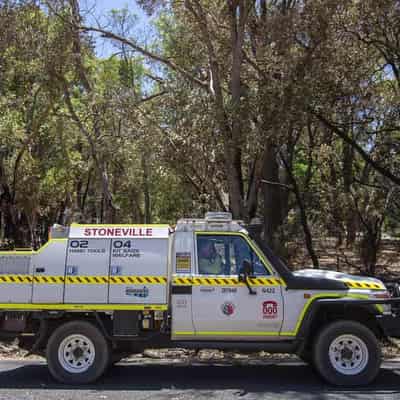 Fire crews battle WA blaze sparked by lightning